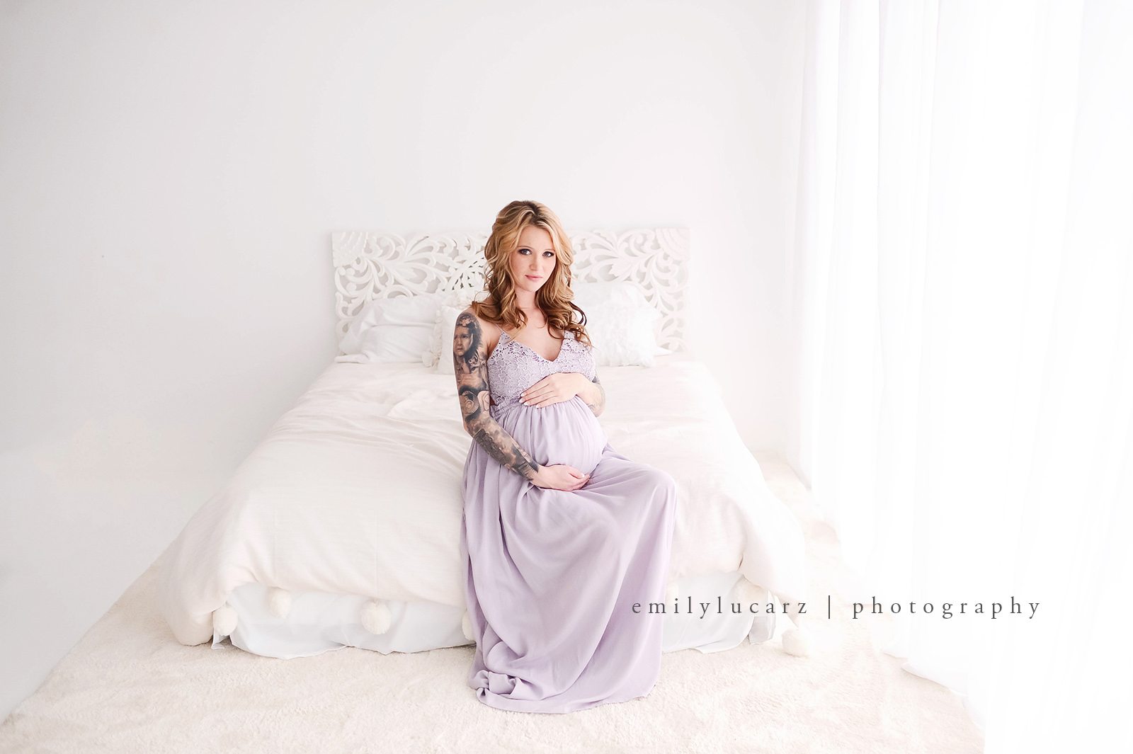 maternity photo shoot in purple dress
